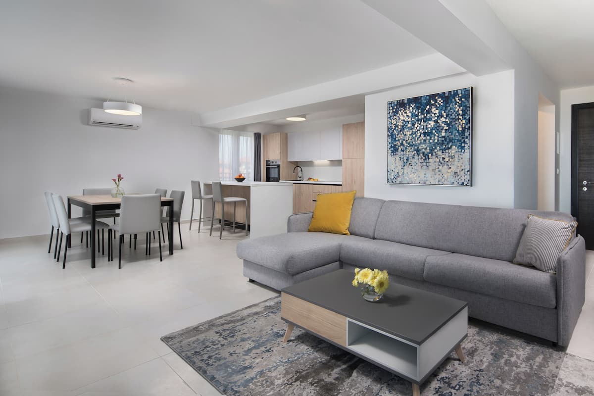 Superior Apartment, 2 Bedrooms | Living area | Flat-screen TV