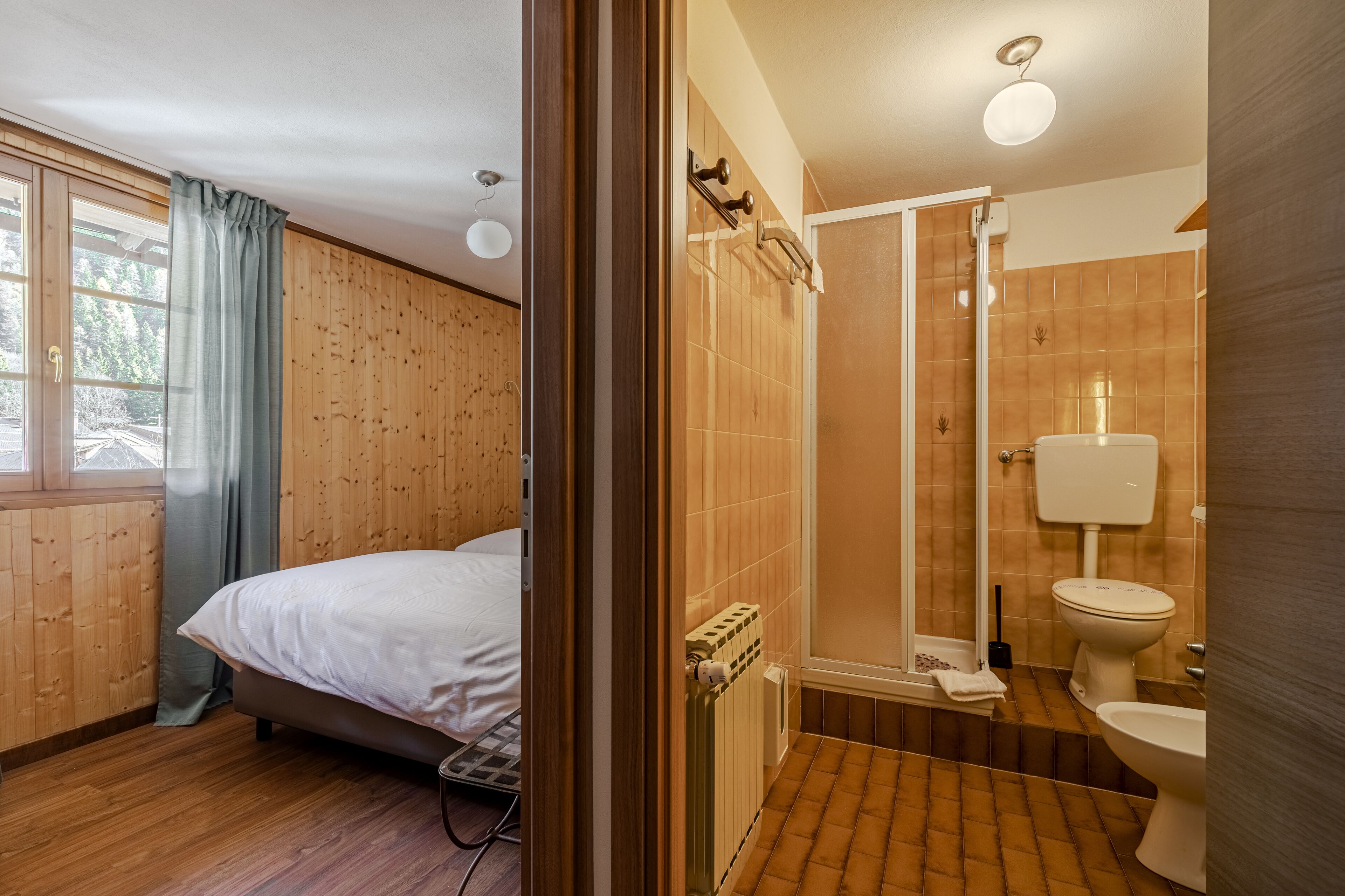 family room, mountain view | 1 bedroom, in-room safe, free wifi, bed sheets