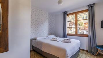 Standaard tweepersoonskamer | Een kluis op de kamer, gratis wifi, beddengoed