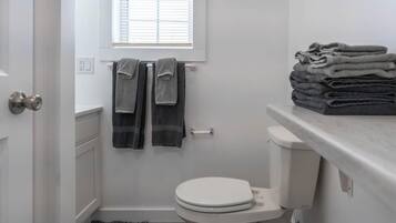 Hair dryer, towels, soap, shampoo