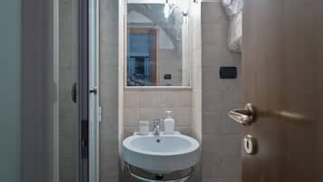 Apartment, 1 Bedroom | Bathroom | Shower, rainfall showerhead, hair dryer, bidet