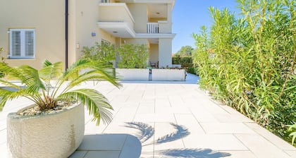 Elegant apartment Mande 1 with a terrace in villa on Krk
