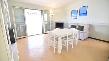Apartment, 2 Bedrooms | Living area | Flat-screen TV