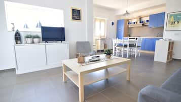 Apartment, 2 Bedrooms | Living area | Flat-screen TV