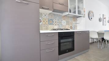 Apartemen, 2 kamar tidur (Golden Jubilee) | Dapur pribadi | Lemari es besar, microwave, oven, dan kompor