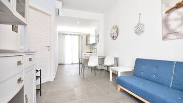 Apartment, 2 Bedrooms (Golden Jubilee) | Living room | Flat-screen TV