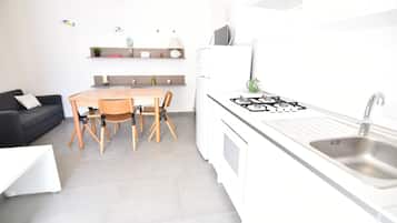 Apartment, 2 Bedrooms (Santa) | Private kitchen | Full-size fridge, oven, stovetop, cookware/dishes/utensils