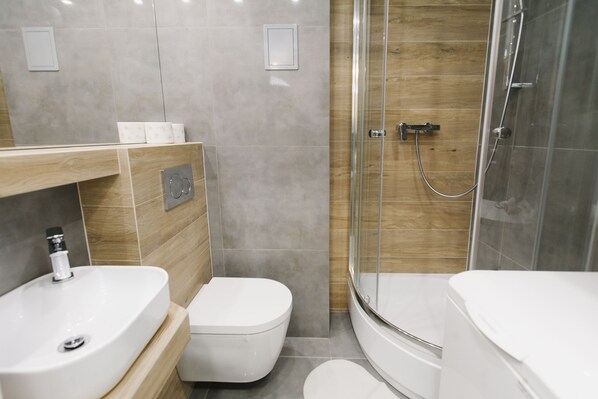 Departamento | Baño | Regadera, secadora de cabello, toallas 