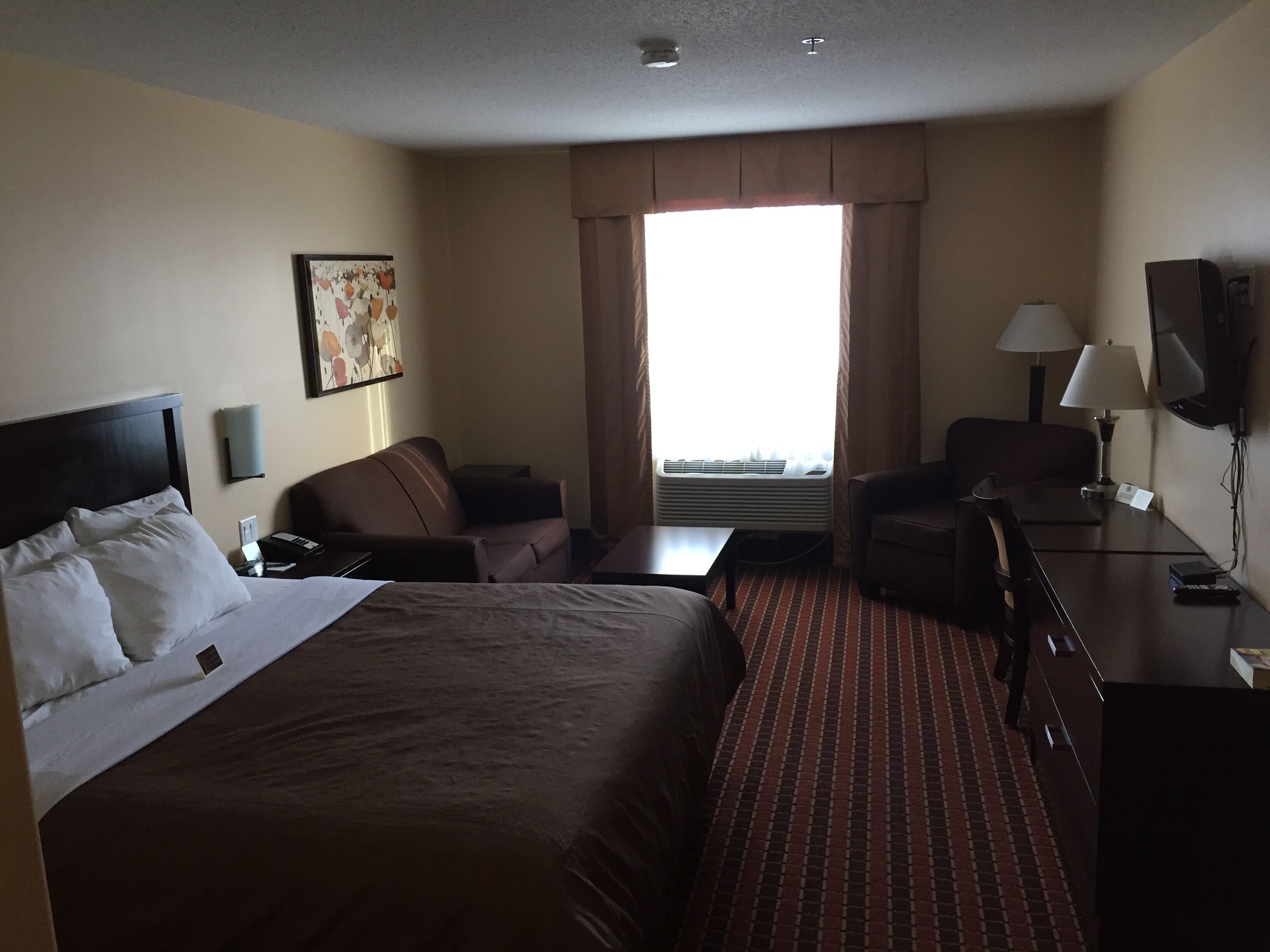 deluxe room | desk, laptop workspace, blackout curtains, soundproofing