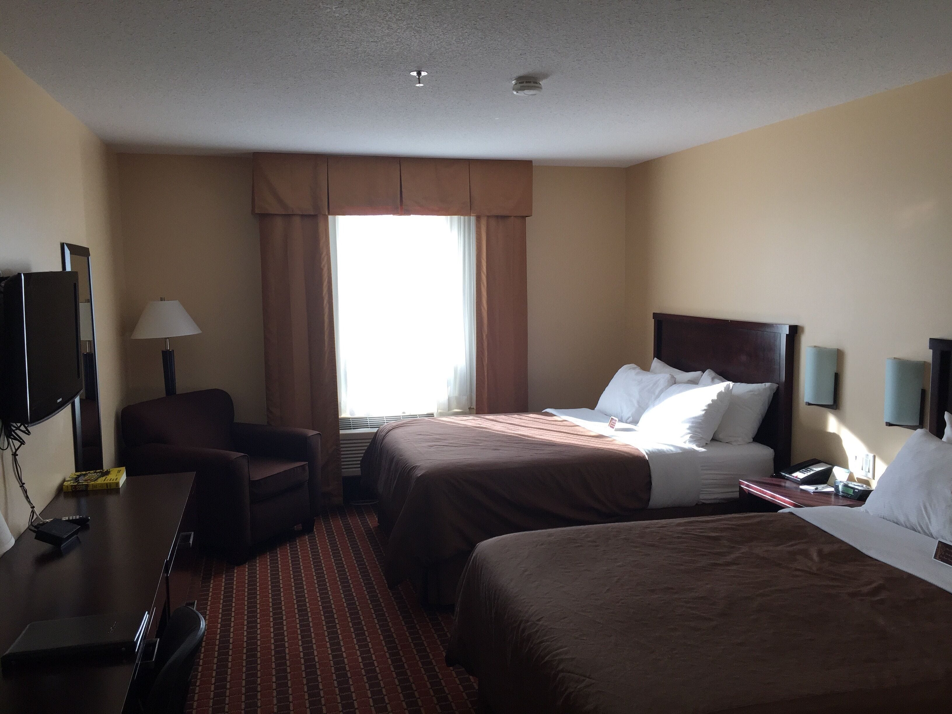 luxury suite | desk, laptop workspace, blackout curtains, soundproofing