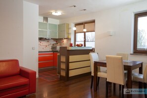 Apartamento | Área de estar | TV de tela plana