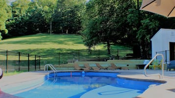 Seasonal outdoor pool, pool umbrellas, pool loungers