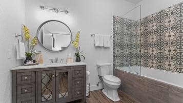 Hair dryer, towels, soap, shampoo