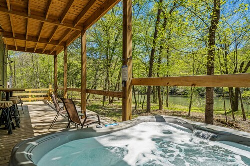 Peaceful Waterfront Mountain Retreat w/ Wood Burning Fireplace, Private Hot Tub