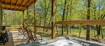 Peaceful Waterfront Mountain Retreat w/ Wood Burning Fireplace, Private Hot Tub