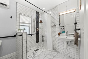 Shower, hair dryer, towels, soap