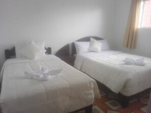 Habitació familiar | Planxa i posts de planxar, wifi gratuïta i roba de llit 