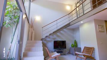 Condo, 1 cama King size (1059 - Villamar 101) | Sala de estar | Televisión