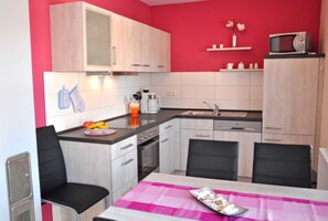 Unclassified image, 4 of 9, button - 3 room first floor - Apartment Ferienhaus Müritzlust - Ferienwohnungen / (Röbel/Müritz)