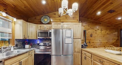 Towering mountain home with private hot tub, game room, & multiple decks