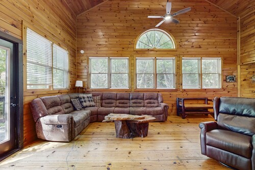 Towering mountain home with private hot tub, game room, & multiple decks