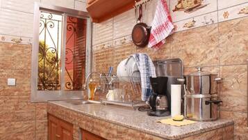 Luxury Apartment, 1 Bedroom | Private kitchen | Microwave, oven, stovetop, electric kettle