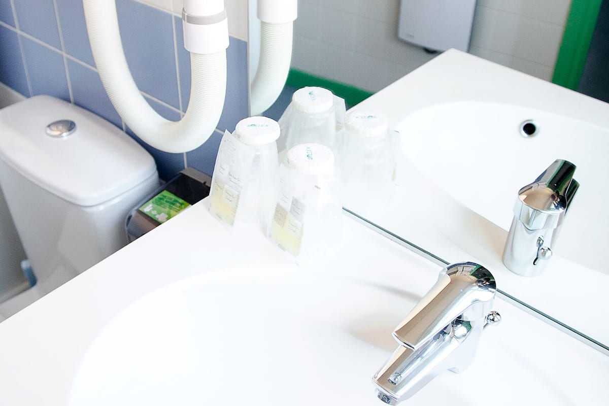 shower, rainfall showerhead, hair dryer, towels