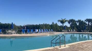 Outdoor pool, a heated pool, sun loungers