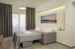 2 habitaciones, tabla de planchar con plancha y cuna de viaje 