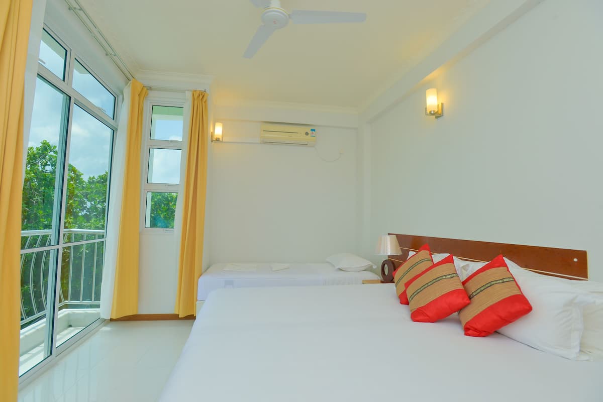 Family Quadruple Room | WiFi (free), individually decorated, individually furnished, bed sheets