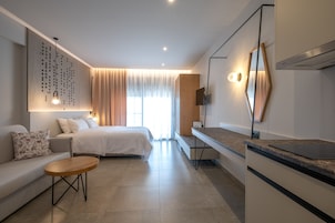Deluxe Apartment, Sea View | Living area | 32-inch flat-screen TV with digital channels, TV