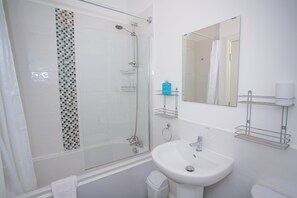 Hydromassage showerhead, hair dryer, towels, soap