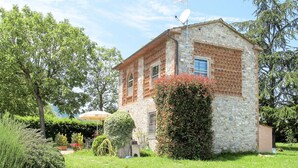 A stone building with a satellite dish, surrounded by lush greenery and a clear sky. - Stunning private villa for 6 people with WIFI, A/C, private pool, TV, terrace and pets allowed (Capannori)
