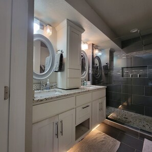 Shower, hair dryer, towels, soap
