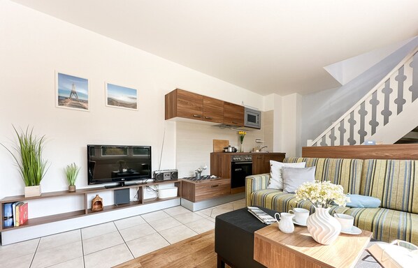 Télévision à écran plat, chaîne hi-fi