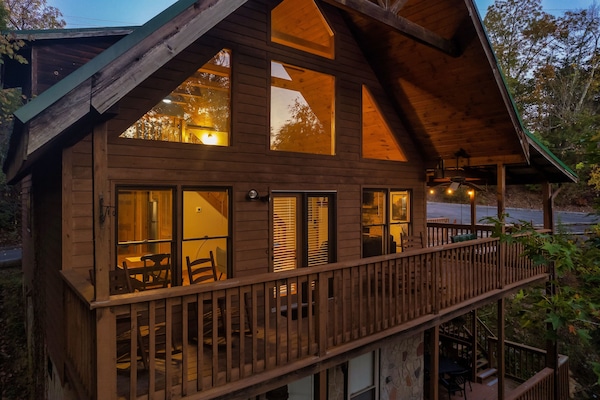 Main deck area faces wooded lot.