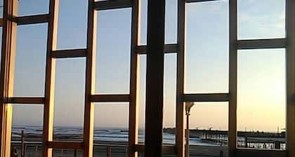 Beach apartment facing the sea.