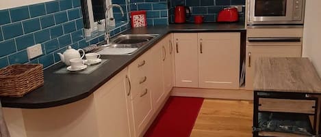 Fridge, microwave, electric kettle, toaster