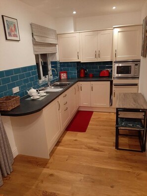 Fridge, microwave, electric kettle, toaster