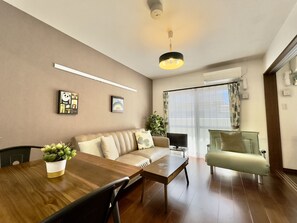 Apartment | Living area | Flat-screen TV - Luana Lea Karate Kaikan Mae (Tomigusuku)