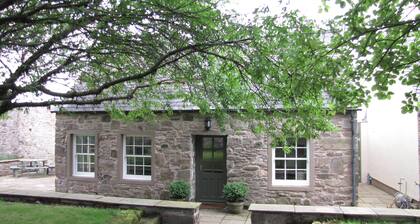The Arns Cottage is a traditional stone built, cosy and luxurious retreat.