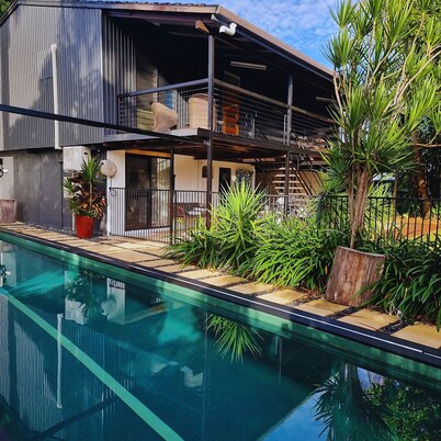 4 BEDROOM TROPICAL HOME + LAP POOL + PARKING FOR CARAVANS, BOATS OR TRAILERS.