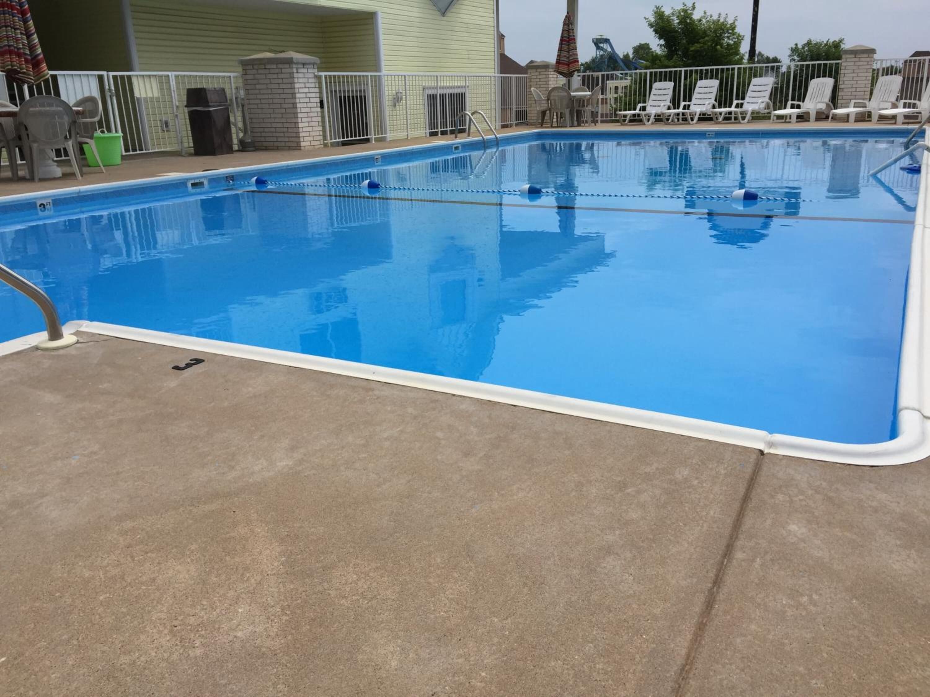 seasonal outdoor pool, open 9:00 am to 10:00 pm, pool loungers