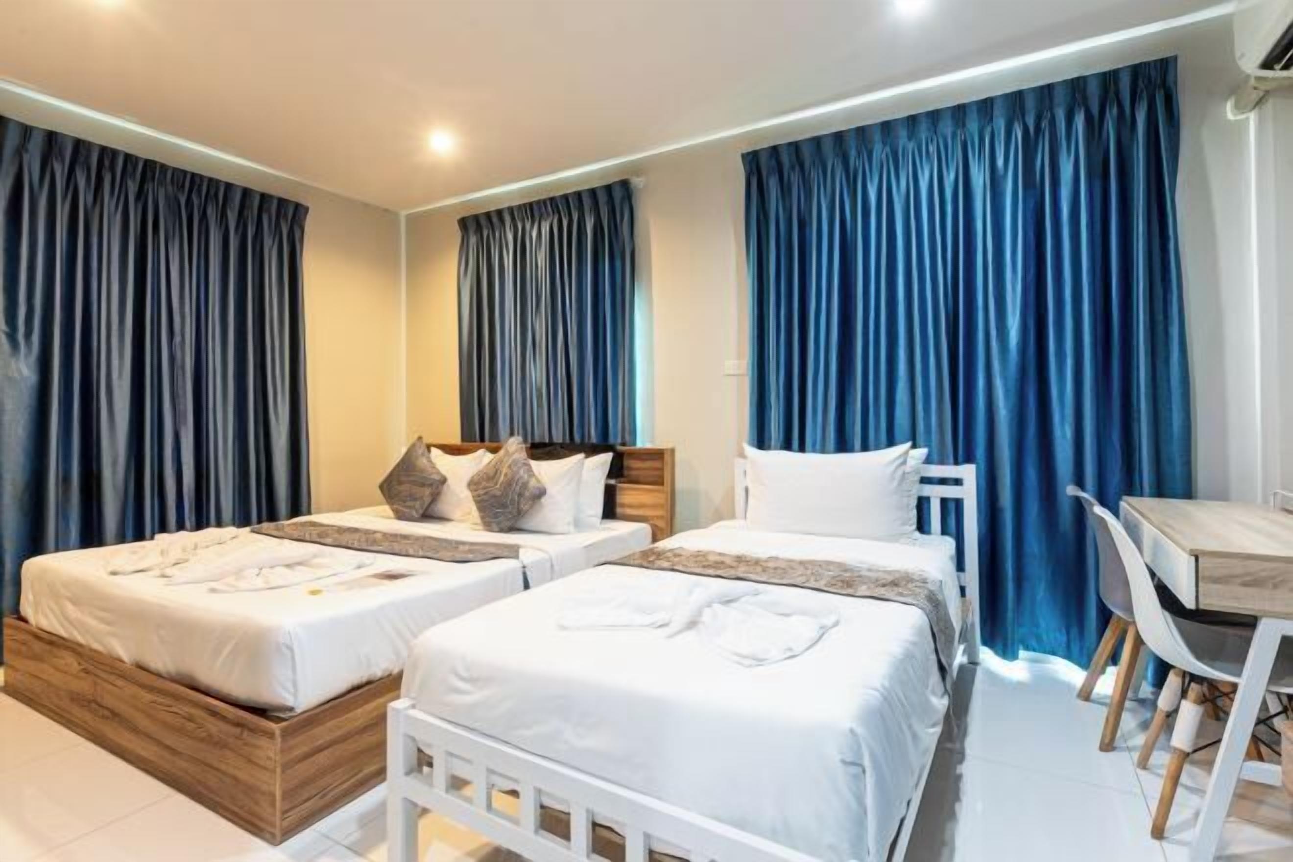 Allergitestet sengetøy, minibar, skrivebord og blendingsgardiner