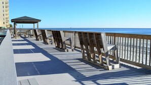 A wooden boardwalk with benches and a gazebo overlooking the ocean. - Sea Oaks 310 - Oceanfront Complex (Oceanview Unit) in Garden City Beach (Garden City)