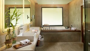A modern bathroom with a large mirror, two sinks, a bathtub, and a large window. - Paradise Trinco Beach  (TRINCOMALEE SRILANKA)