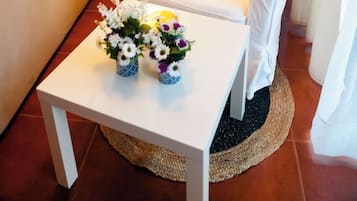 Departamento superior, Terraza, planta baja | Área de sala de estar