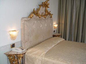 Suite Exclusive | Copriletto in piuma, minibar, una cassaforte in camera, insonorizzazione