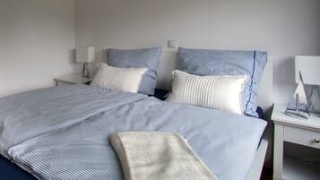 2 quartos, cofres nos quartos, ferros/tábuas de passar roupa, Wi-Fi