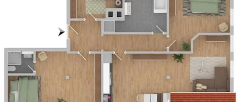 Een plattegrond van een hotelkamer met een bed, een badkamer, een zithoekje en een kitchenette.